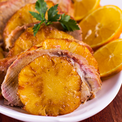 Lombo coberto por laranjas